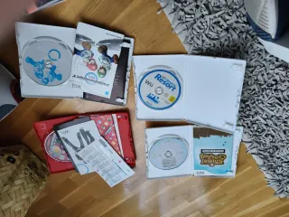 4 Juegos Wii: Mario Kart, Animal Cross,new super,