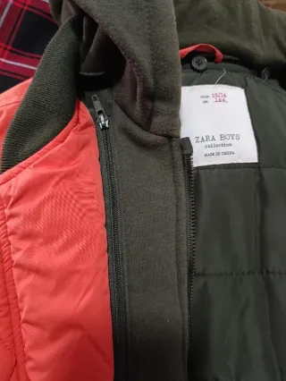 Chaqueta niño bomber naranja y verde con capucha