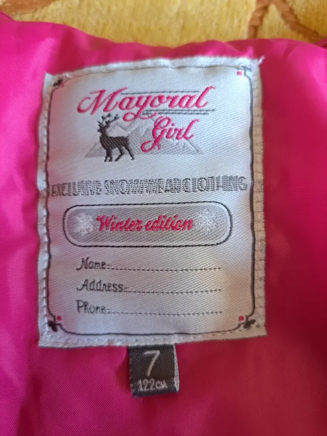 Mono de nieve rosa para niña