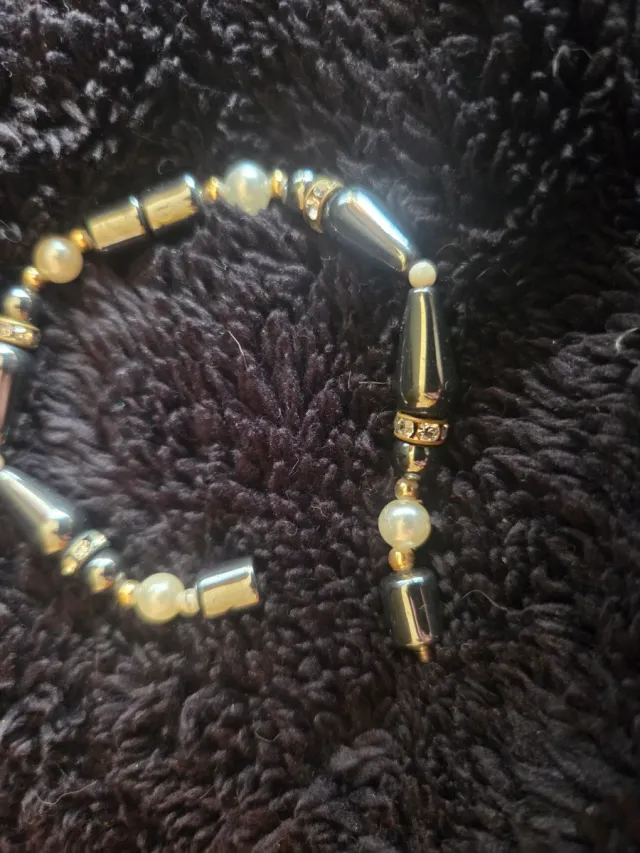 Pulsera elegante dorada y plateada