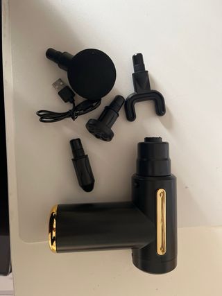 Pistola Masajeador Muscular Negro Dorado