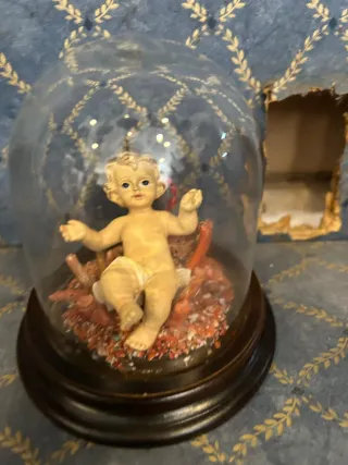 Bambino in teca con base in legno