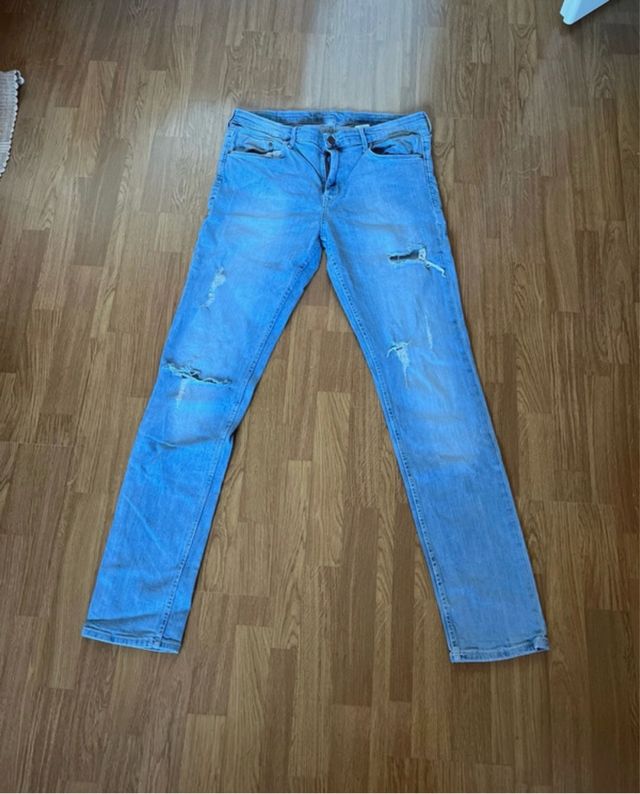 Jeans blu strappati