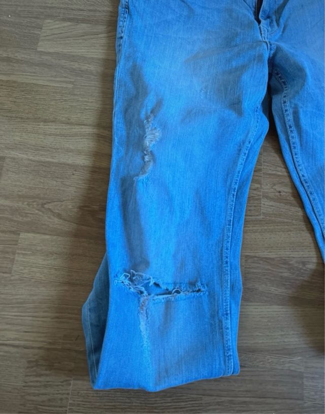 Jeans blu strappati
