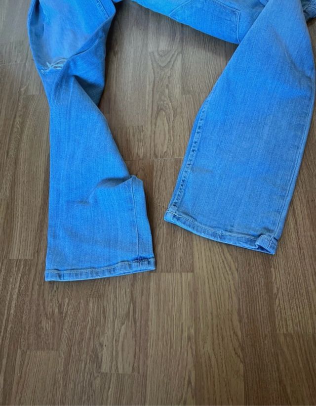 Jeans blu strappati
