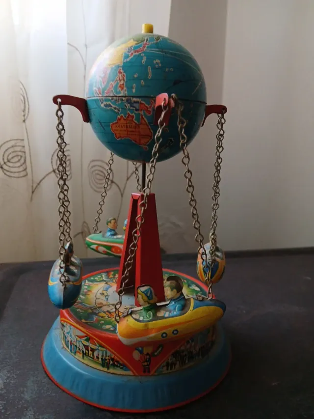 Antiguo Carrusel de ojalata funciona