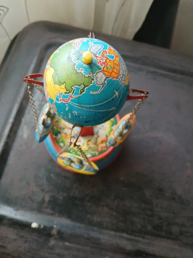 Antiguo Carrusel de ojalata funciona