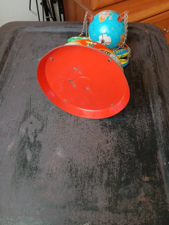 Antiguo Carrusel de ojalata funciona