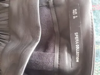 Falda Sfera polipiel negra flecos midi