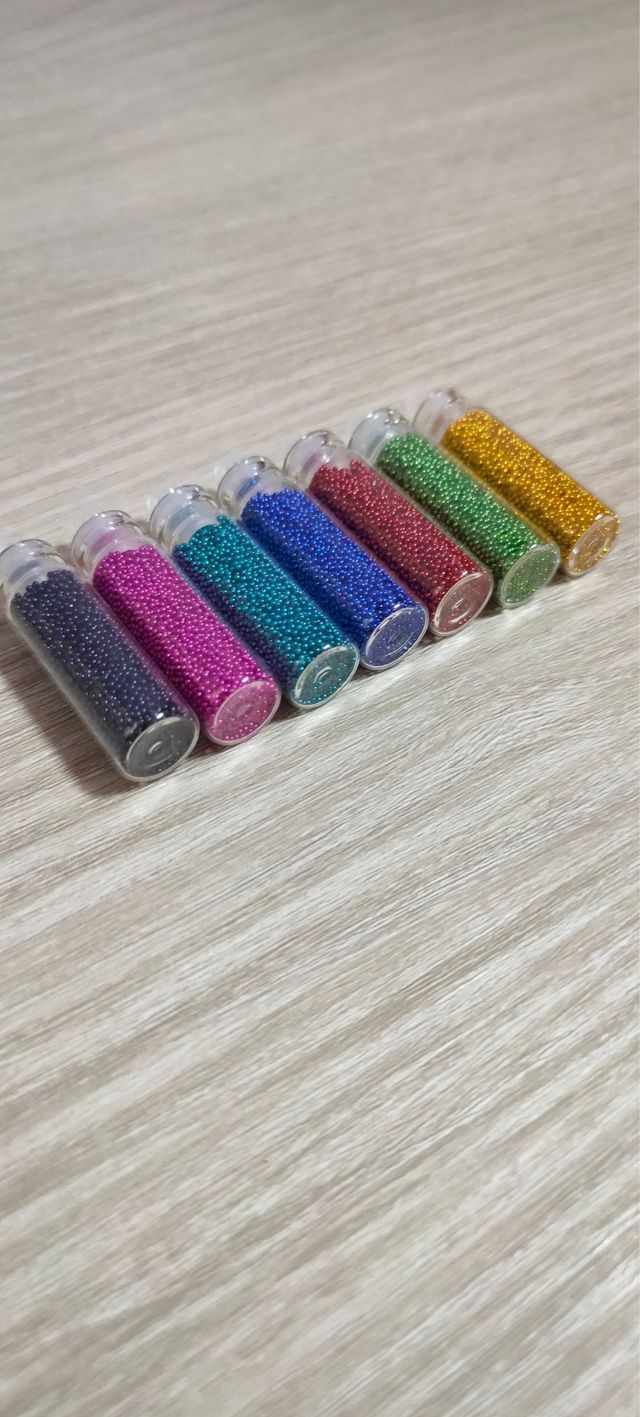 Lote 7 botellitas caviar perlas