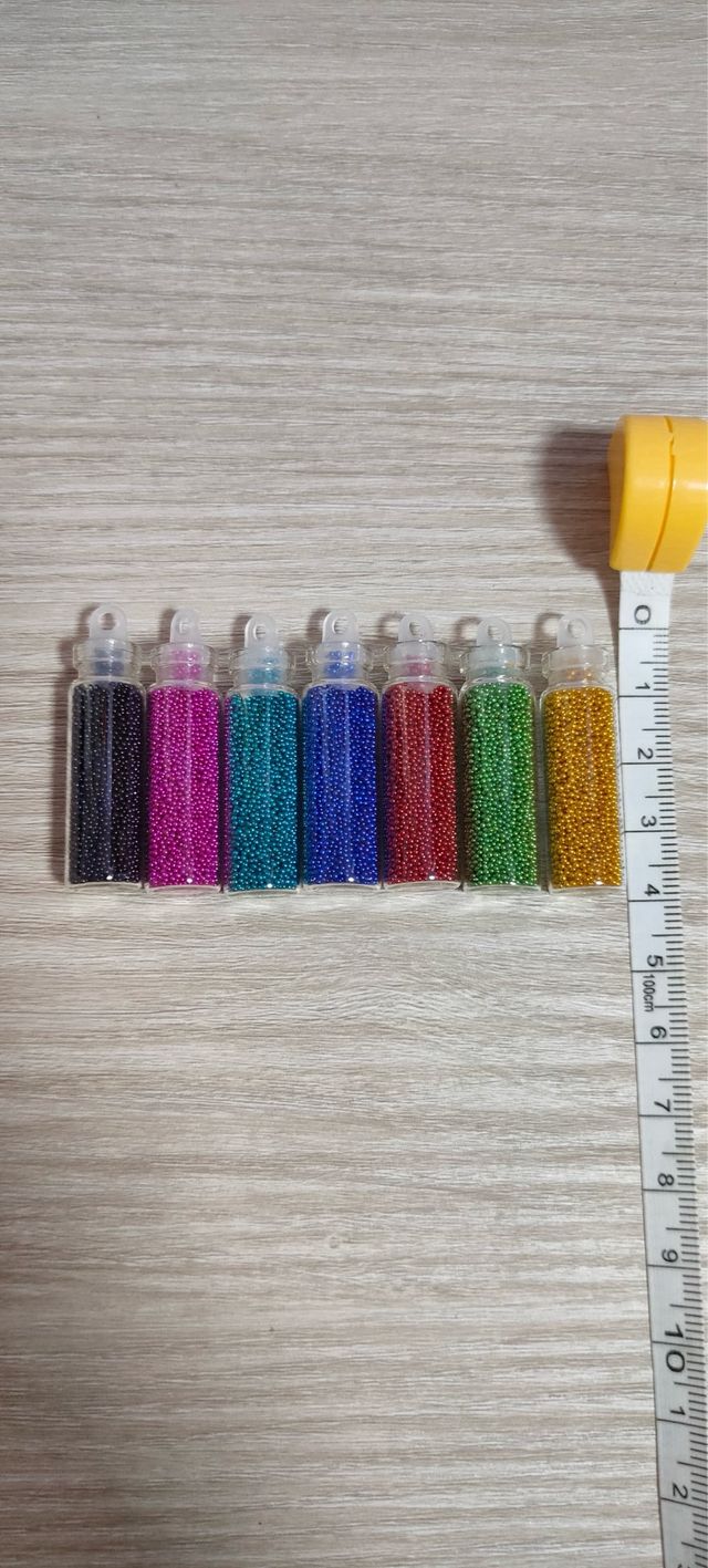 Lote 7 botellitas caviar perlas