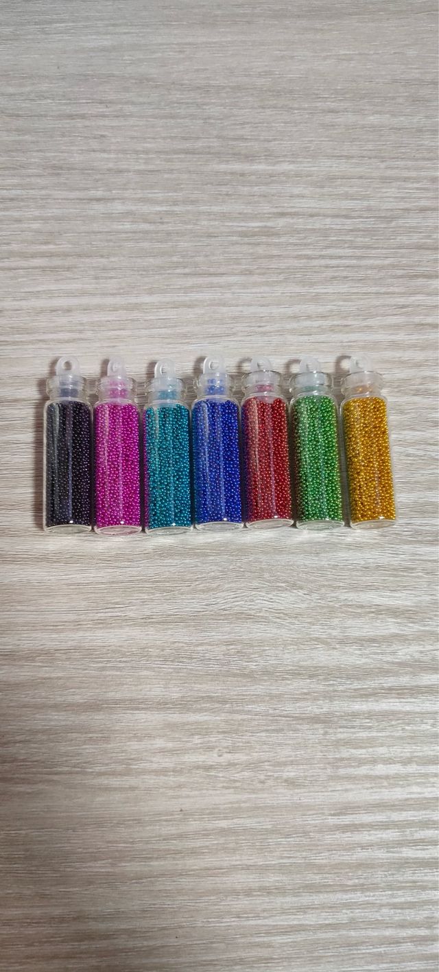 Lote 7 botellitas caviar perlas