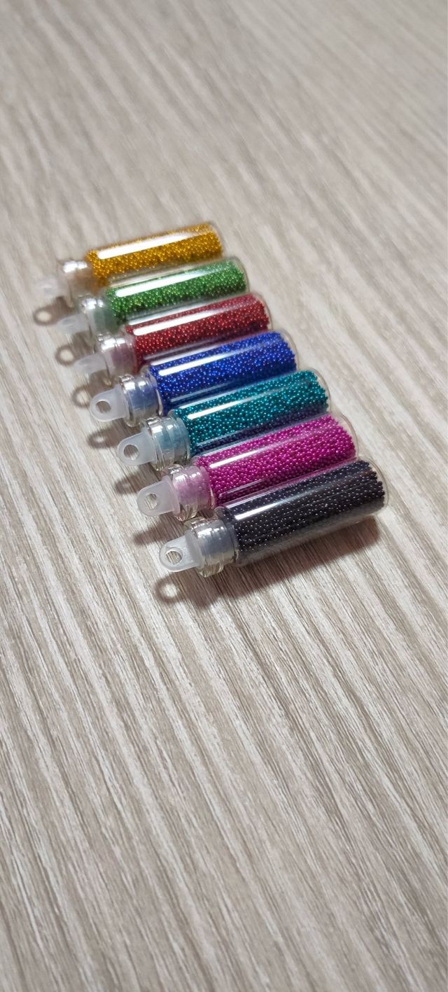 Lote 7 botellitas caviar perlas