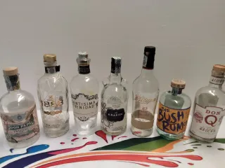 Lotto 7 bottiglie vuote rum diverse