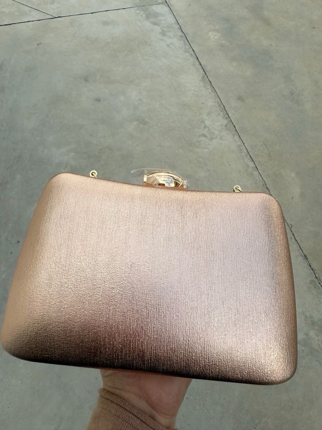 Bolso de mano dorado rosado con cadena