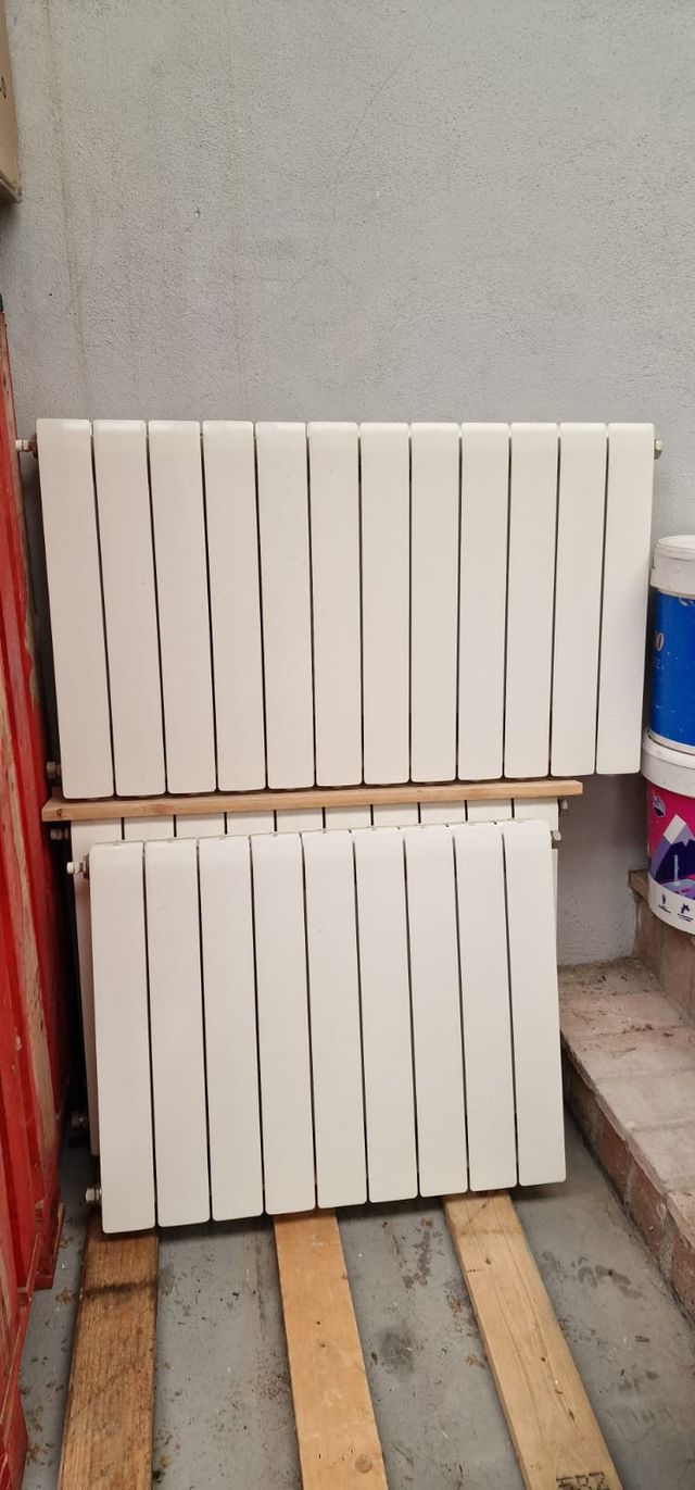 9 Radiadores Blancos de Aluminio.