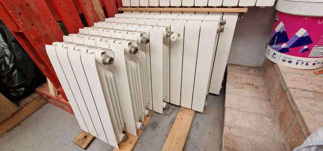 9 Radiadores Blancos de Aluminio.