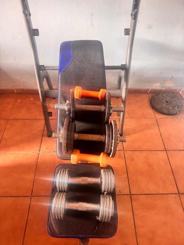 Banco Domyos + pack mancuernas y discos