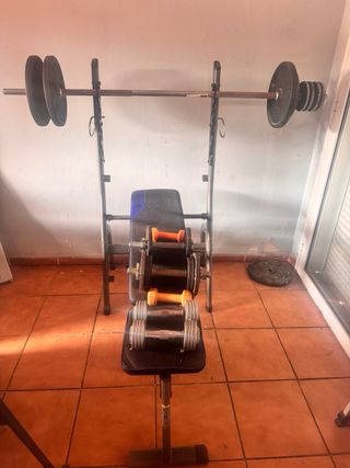 Banco Domyos + pack mancuernas y discos