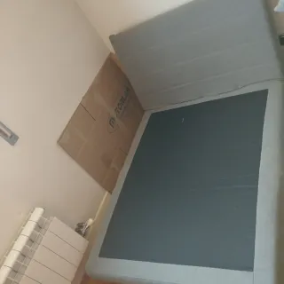 Sofá cama auxiliar gris tela