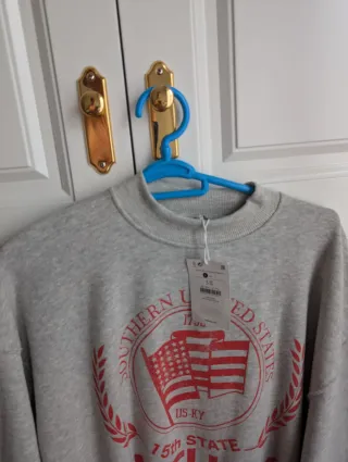 Sudadera Bershka oversize gris talla S