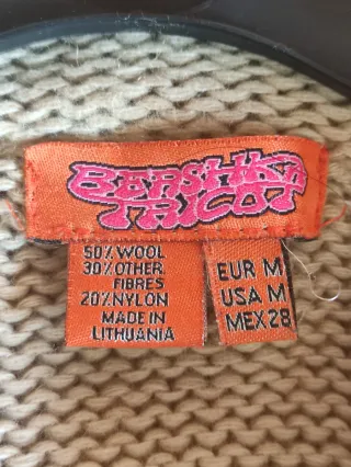 Chaqueta beige de punto con cremallera