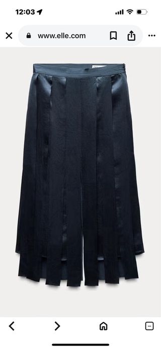 Falda satinada con flecos