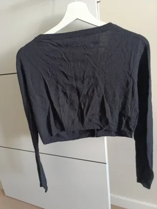 Torera negra con tachuelas