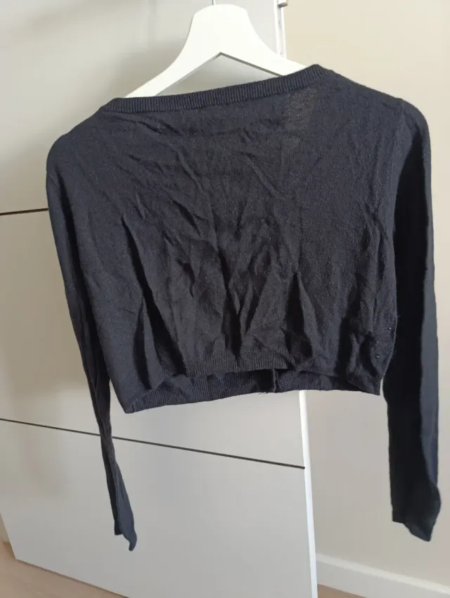 Torera negra con tachuelas