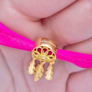 CHARM ATRAPASUEÑOS DORADO PLUMAS