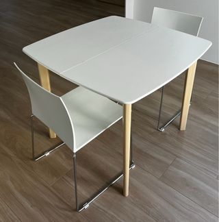 4 sillas apilables blancas cromadas diseño