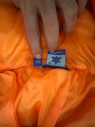 Abrigo Valencia Basket hombre azul y naranja