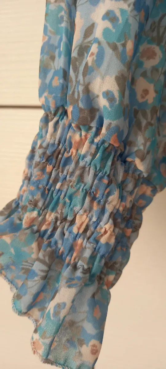 Blusa fantasia manica lunga