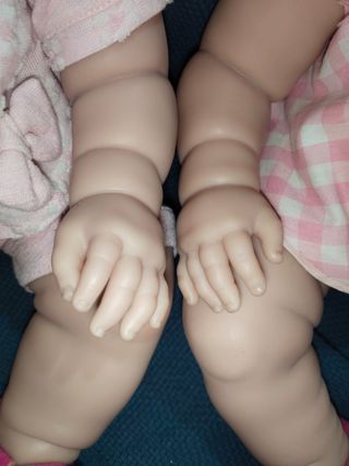 Carrito gemelar con 2 muñecas