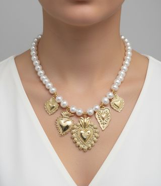 Collana perle e cuori dorati