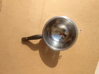 Scolapasta in metallo e plastica