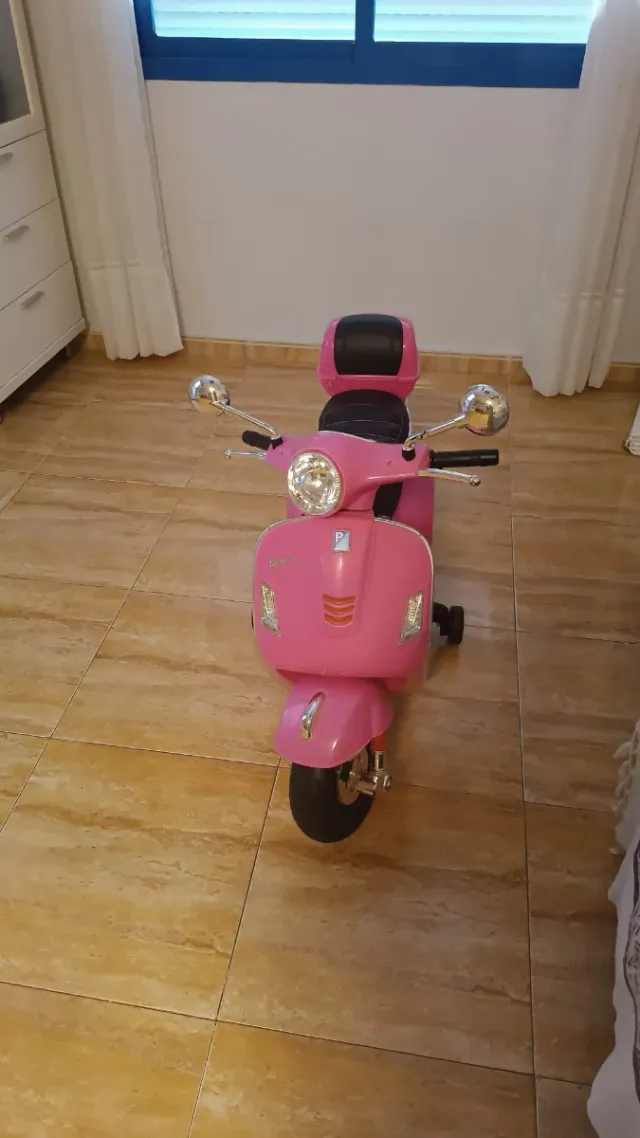 Moto rosa para niñas