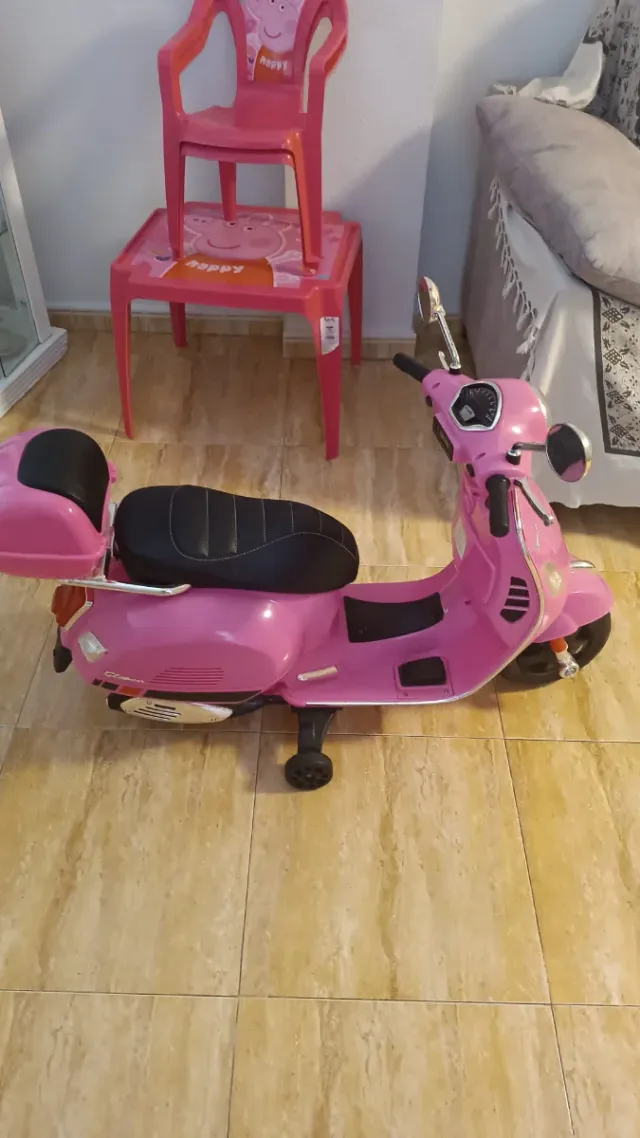 Moto rosa para niñas