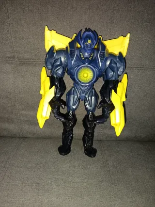 Muñeco de juguete robot azul y amarillo