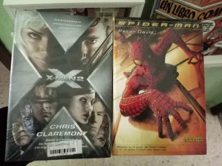 Lote tomo Spiderman y 2 libros para coleccionistas