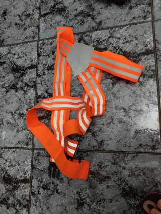 Chalecos reflectantes y faja seguridad