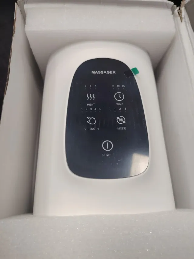 Masajeador de manos blanco y negro