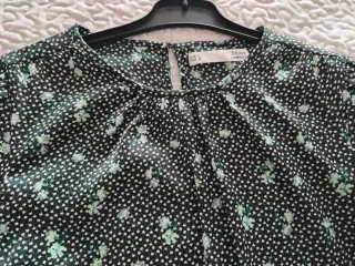 Blusa satinada estampada