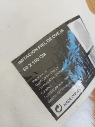 Alfombra de lana blanca