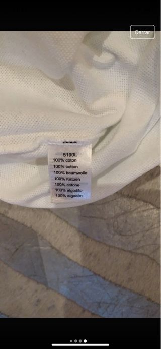 Polo Lacoste blanco con logo bandera USA