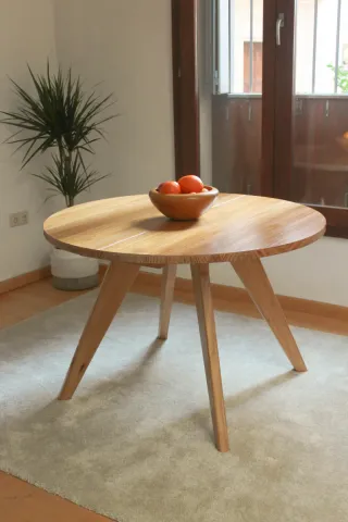 Tavolo rotondo allungabile in legno massello