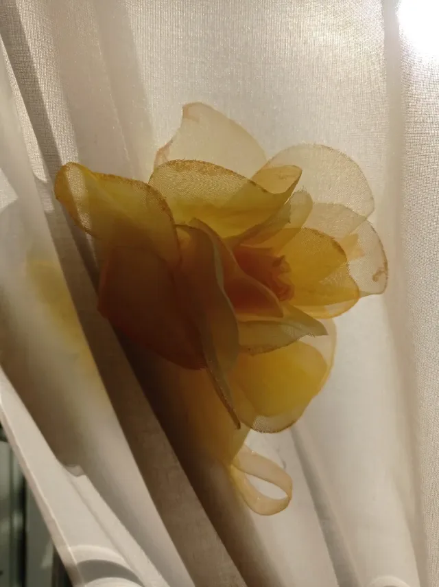 Calamita per tende a forma di fiore