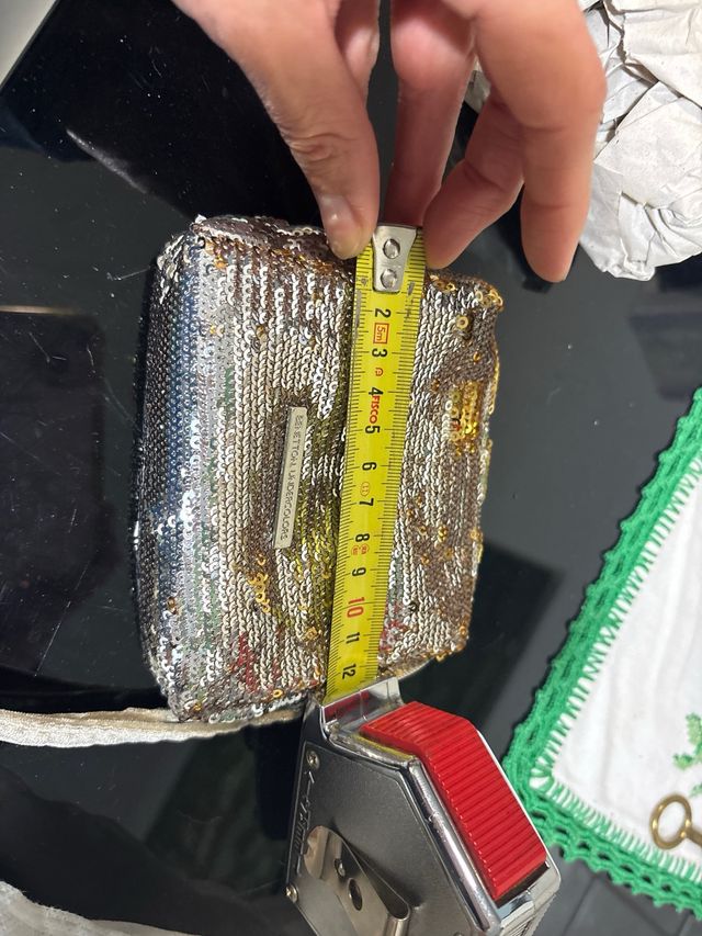 Monedero Benetton lentejuelas oro y plata