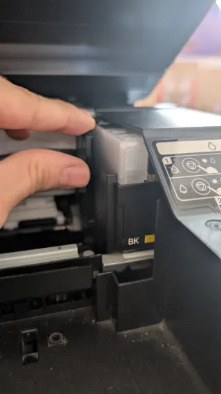 Impresora Epson XP-2100 con cartuchos recargables