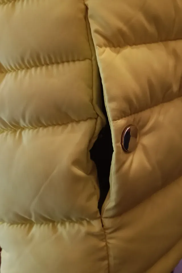 Chaleco acolchado amarillo niña